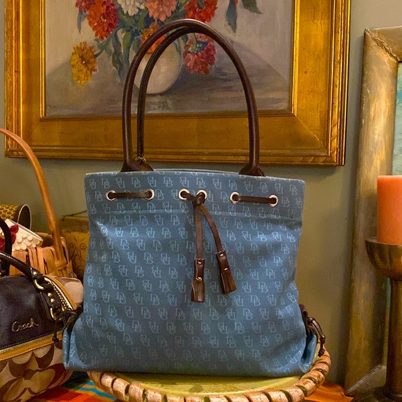 Dooney & Bourke Handbags - Dooney & Bourke Blue Signature Canvas and Leather Tassel Tote Bag